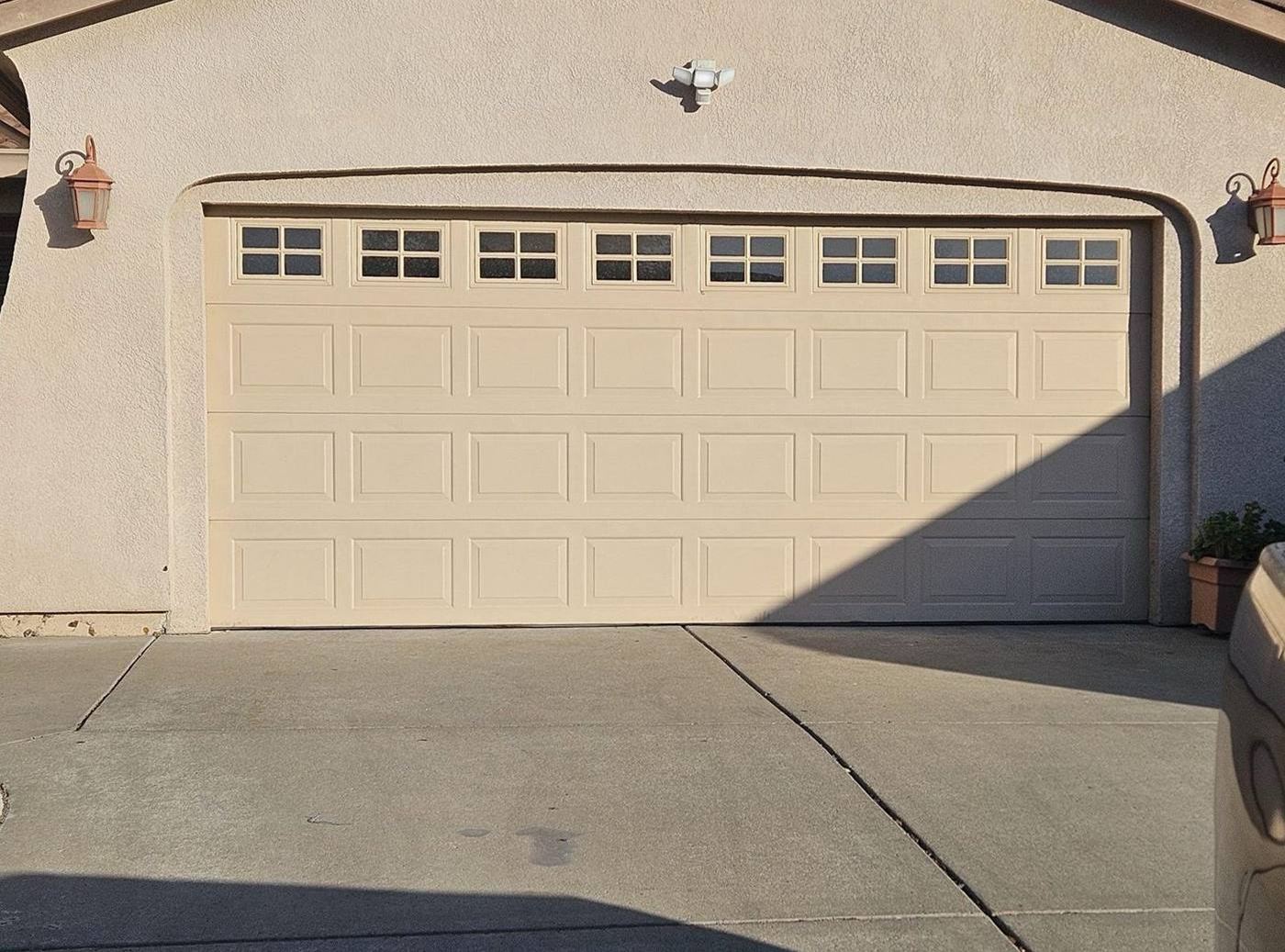 Repaired garage door closed and level