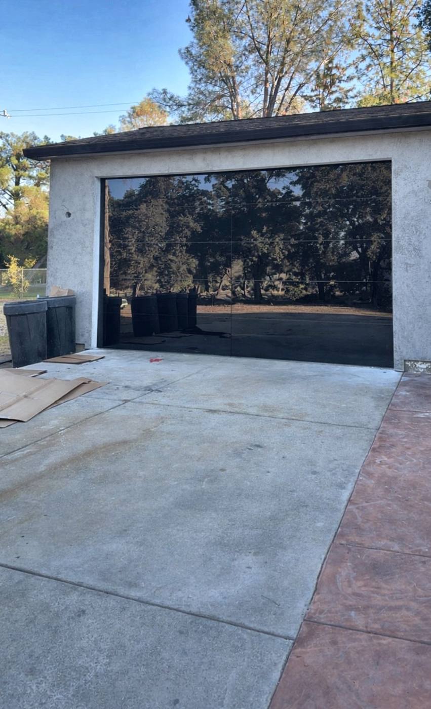 Black full-view glass single garage door