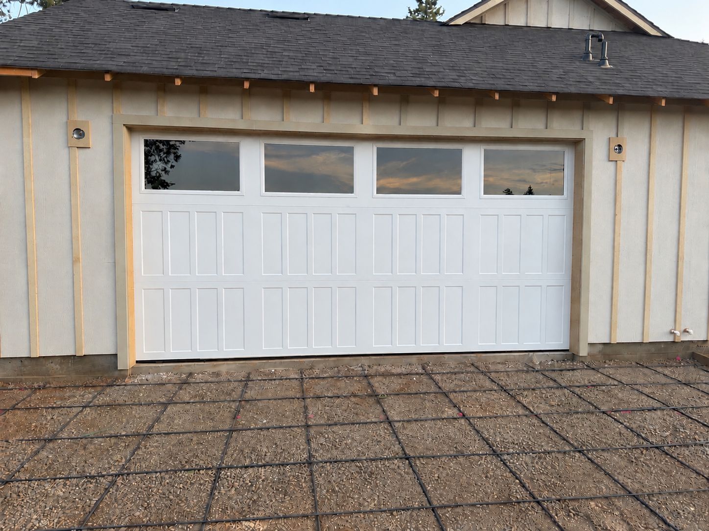 White carriage-style double garage door