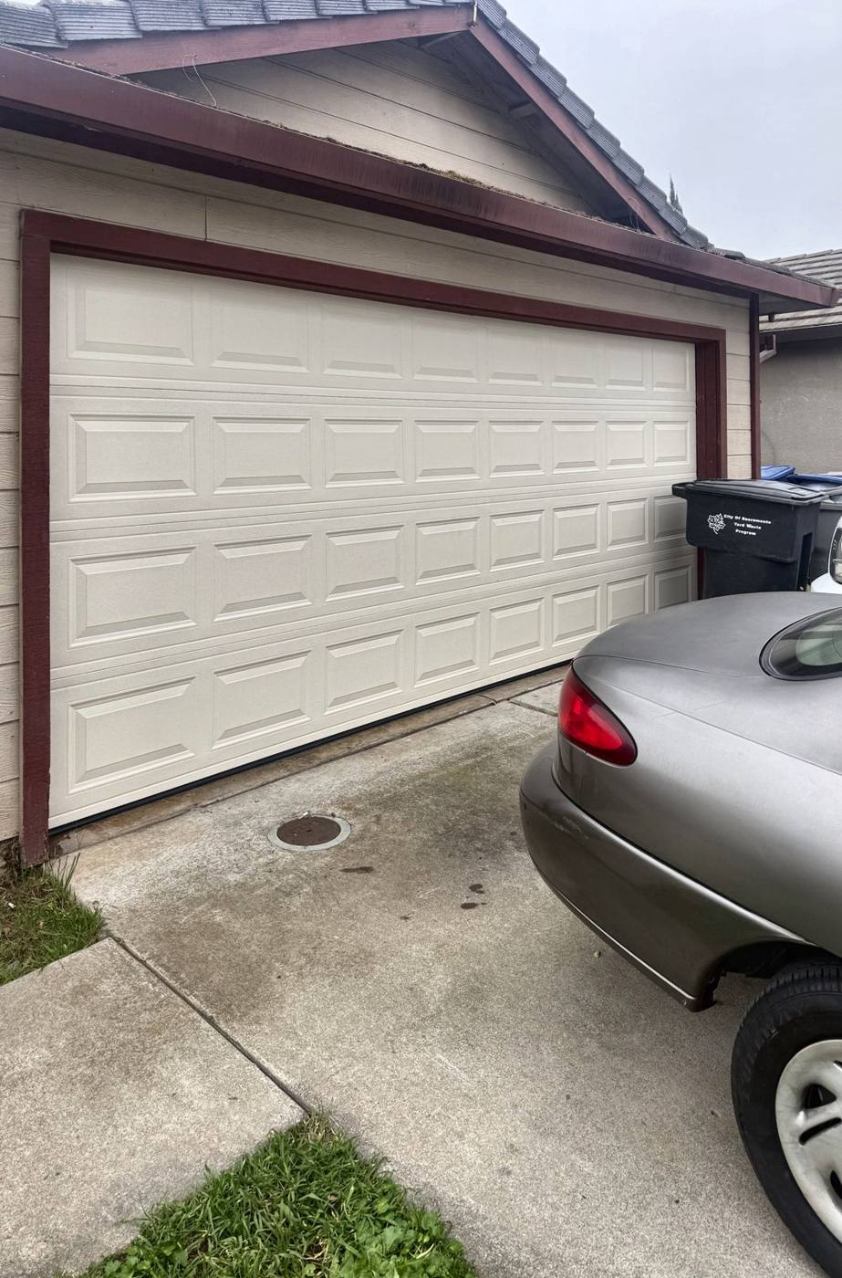 White raised-panel garage door