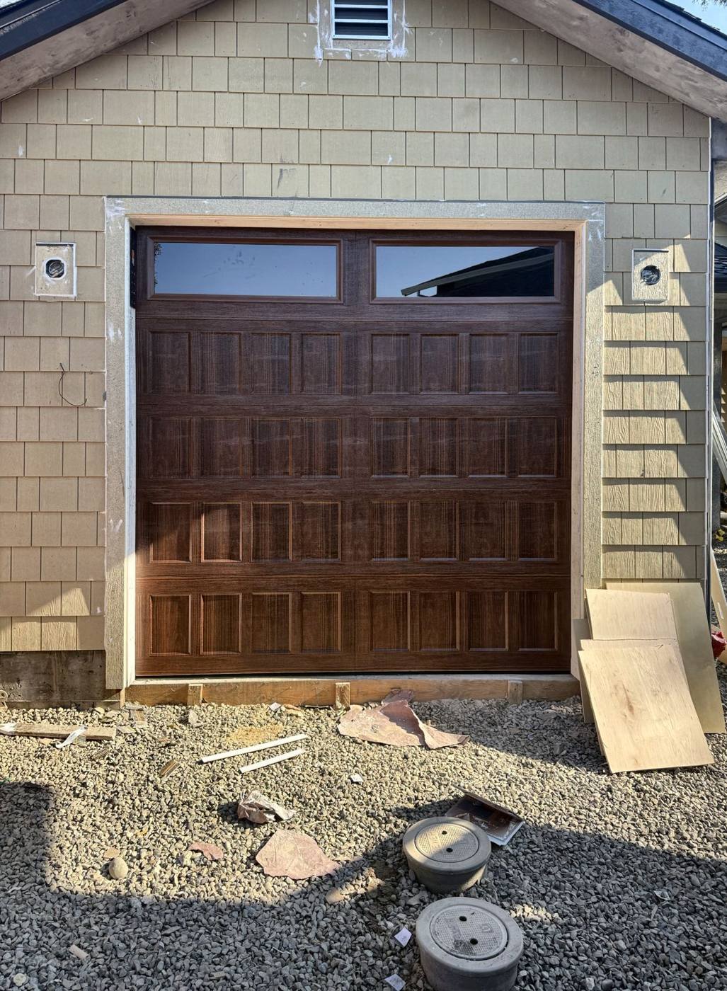 Woodgrain carriage-style garage door