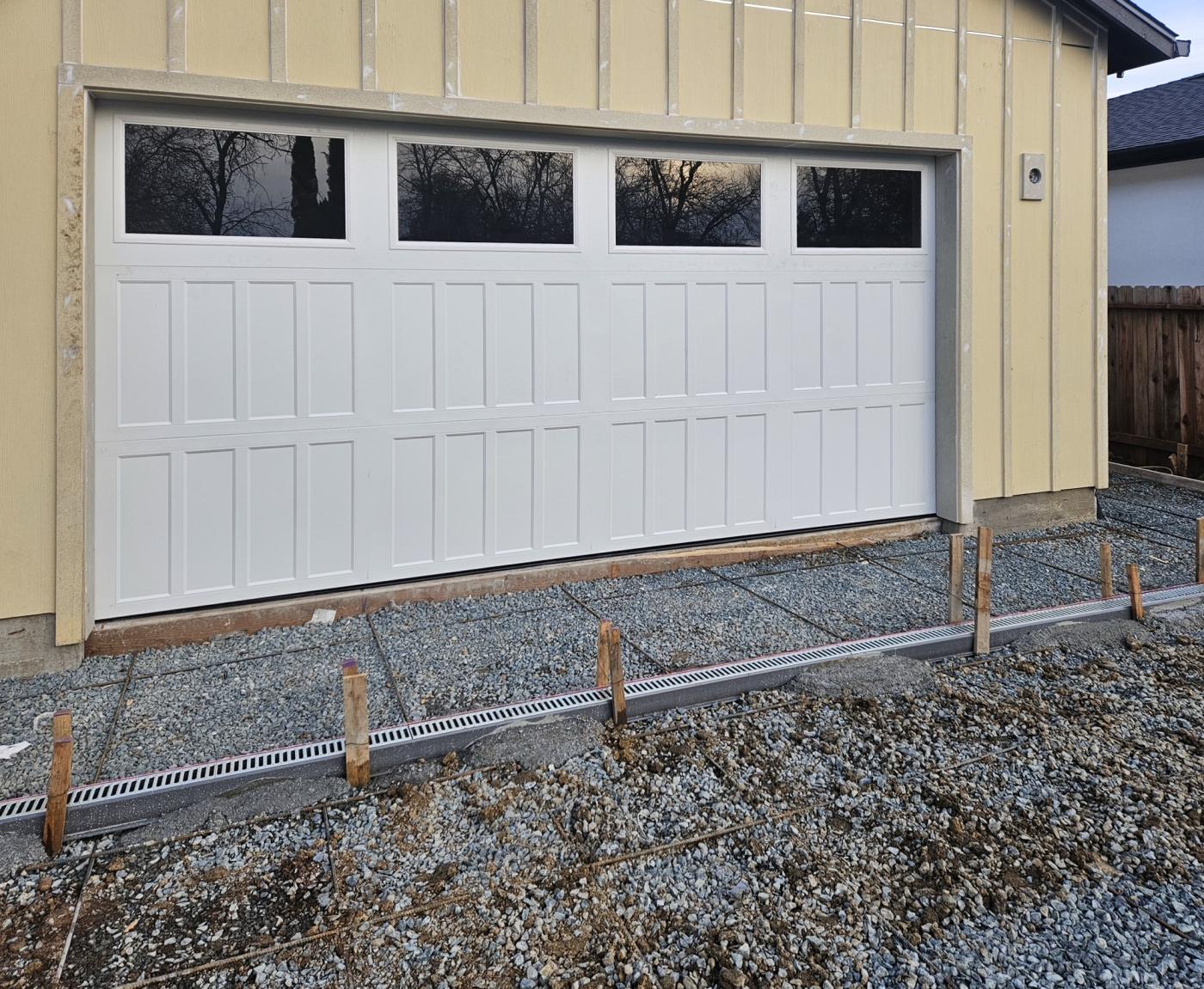 White 3-panel garage door with top windows